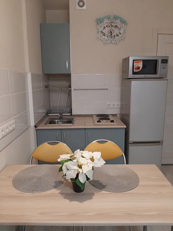 Уютная студия в новом доме с панорамным видом на город