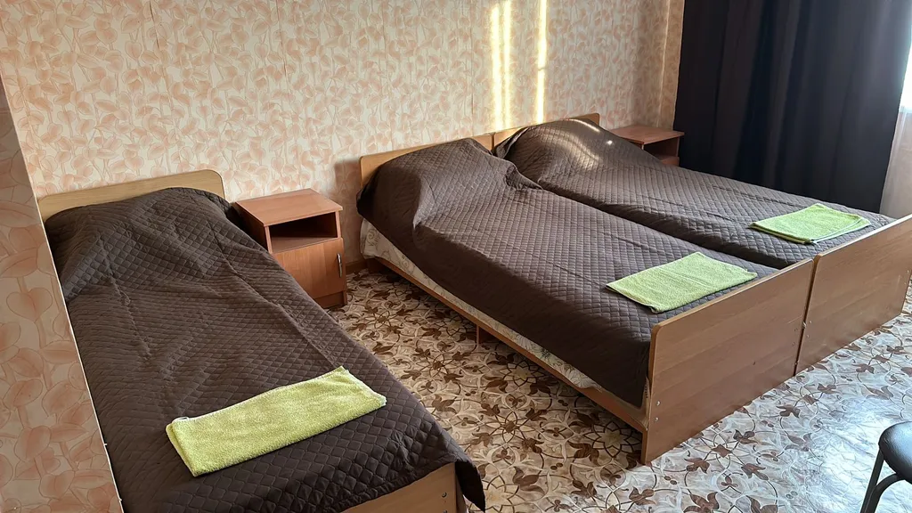 Трехместный номер с видом на сад