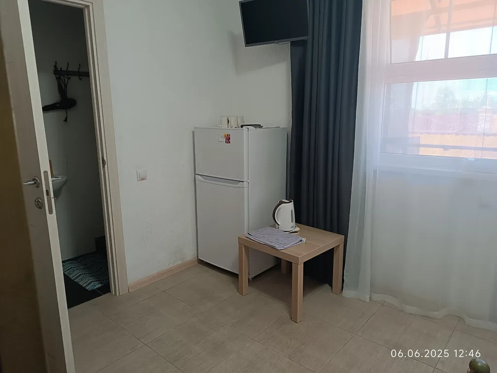 Номер со своим двором и общей кухней