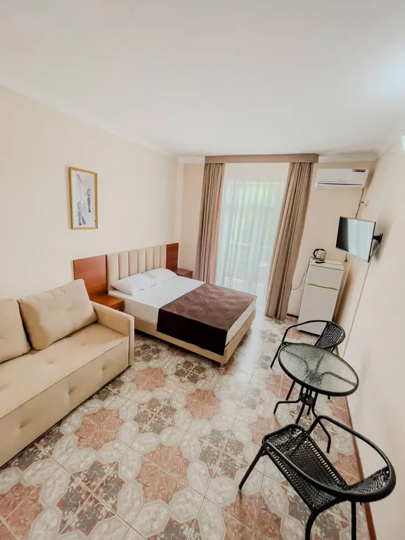 Трехместный номер с балконом