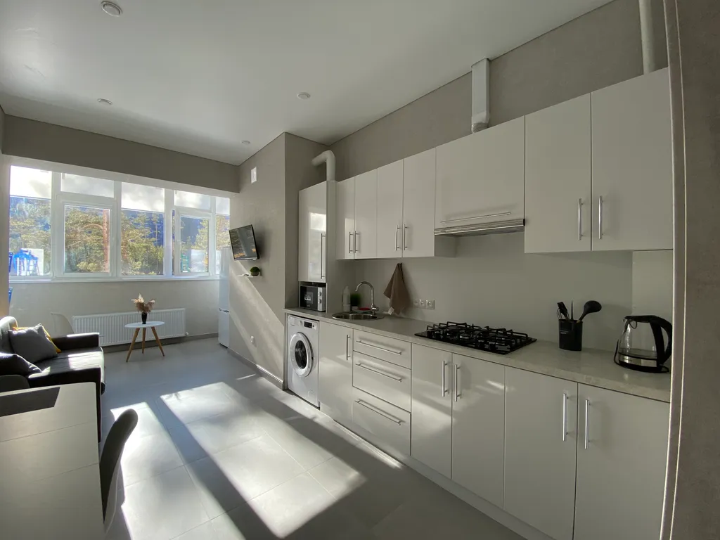 Уютный апартамент на берегу реки с видом на горы