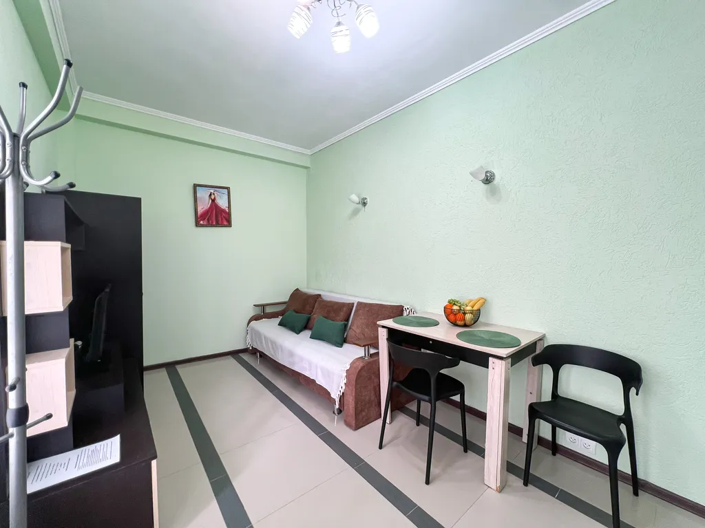 Семейный номер с кухней в центре