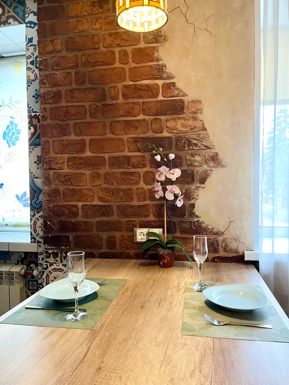 Двухкомнатная квартира в самом центре города с дизайнерским ремонтом