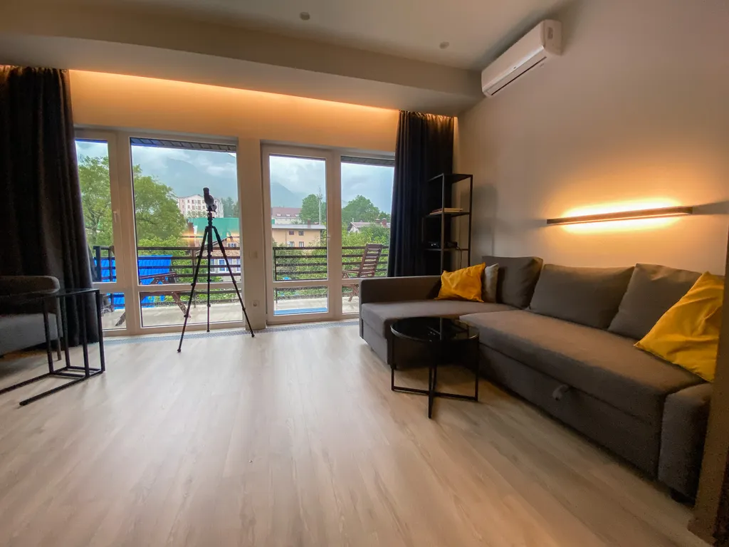 Апартаменты с террасой с панорамным видом на горы