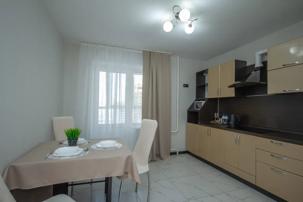 Комфортная квартира с видом на город и Волгу