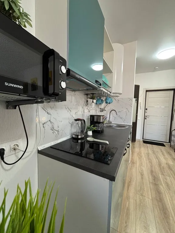 Уютная студия с террасой с видом на горы и бассейны