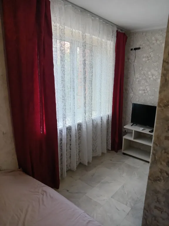 Уютная комната в золотом квадрате Западного