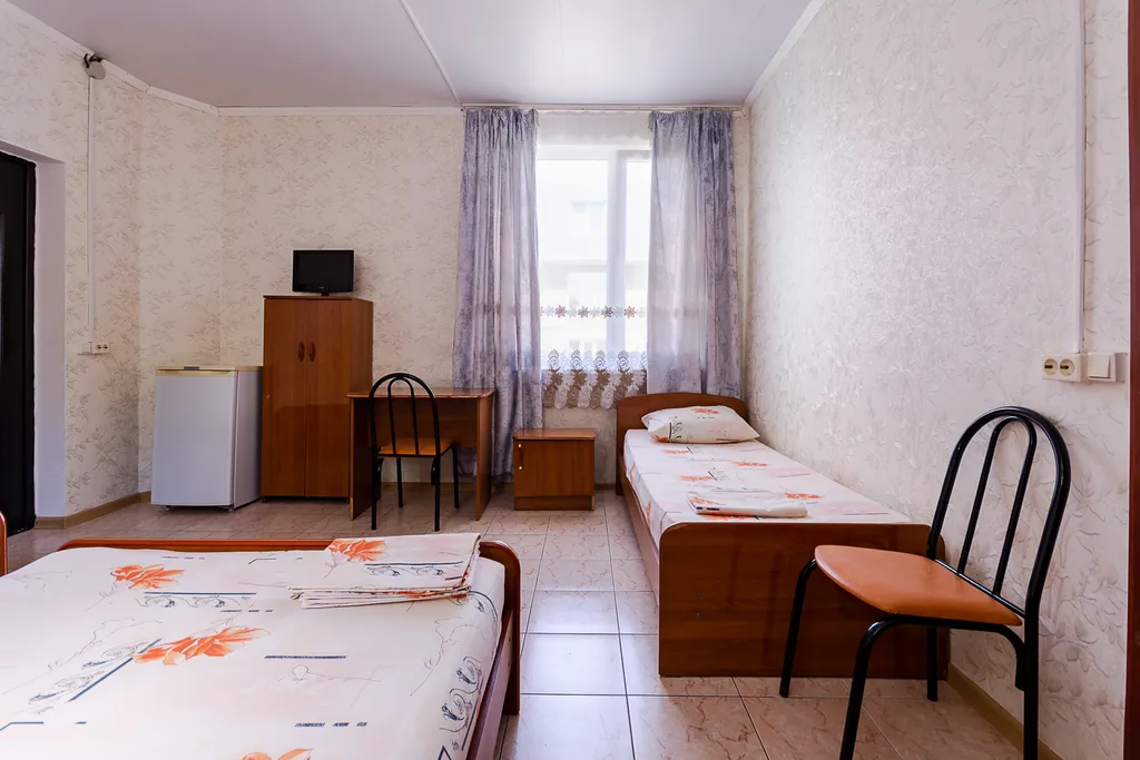 Четырёхместный номер с удобствами, парковка в подарок