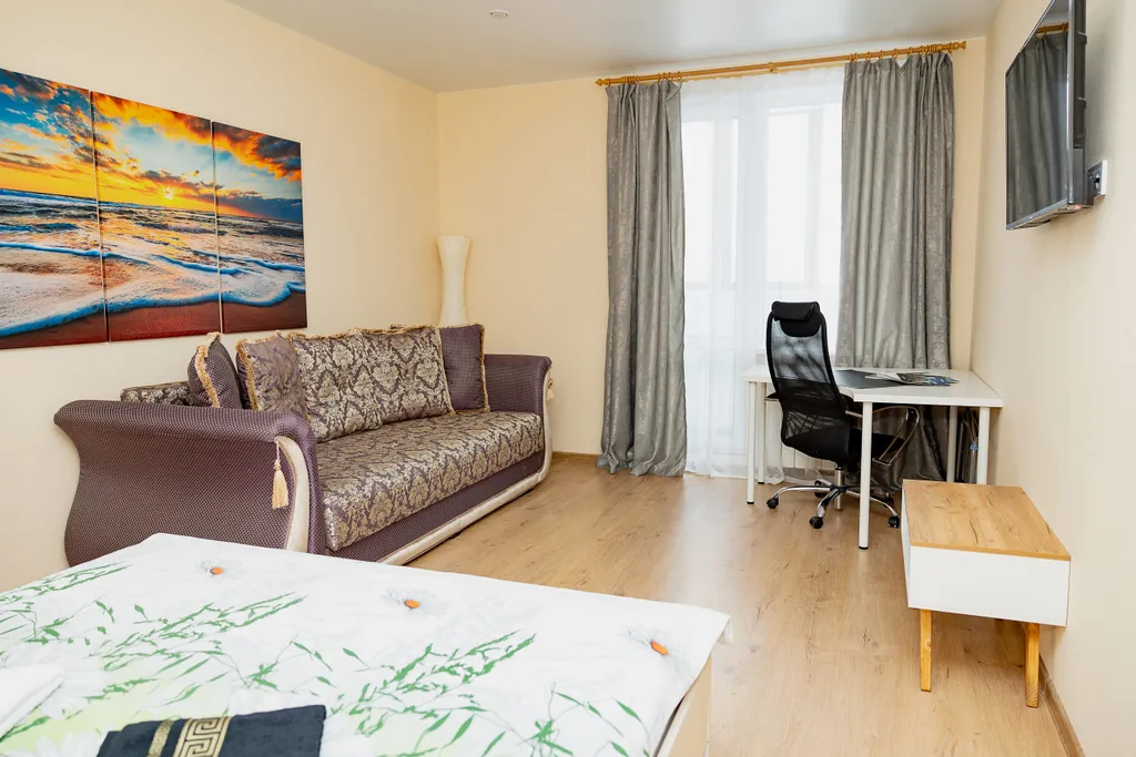 Апартаменты Домино возле набepeжной pеки Иртыш