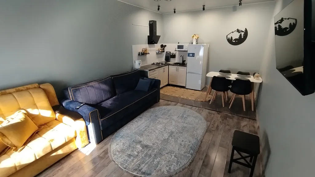 Квартира Двухэтажные апартаменты в центре, своя мангальная зона и тёплый гараж — аренда посуточно в Тырныауз