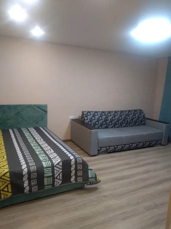 Уютная квартира в центре города с кондиционером и видом на памятник Победы