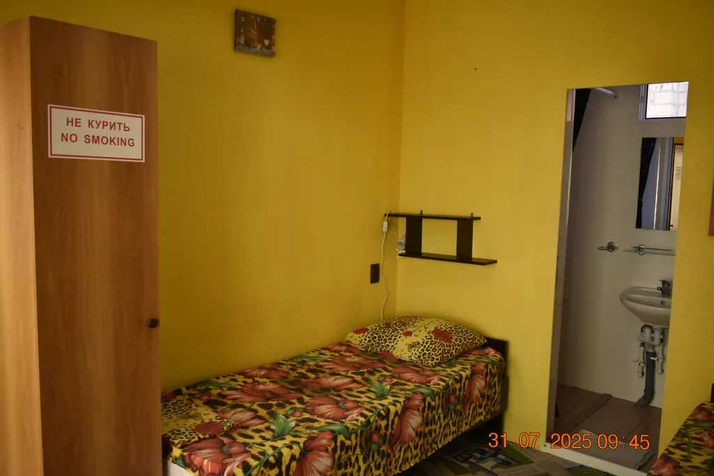 Номер на первом этаже с двумя отдельными кроватями