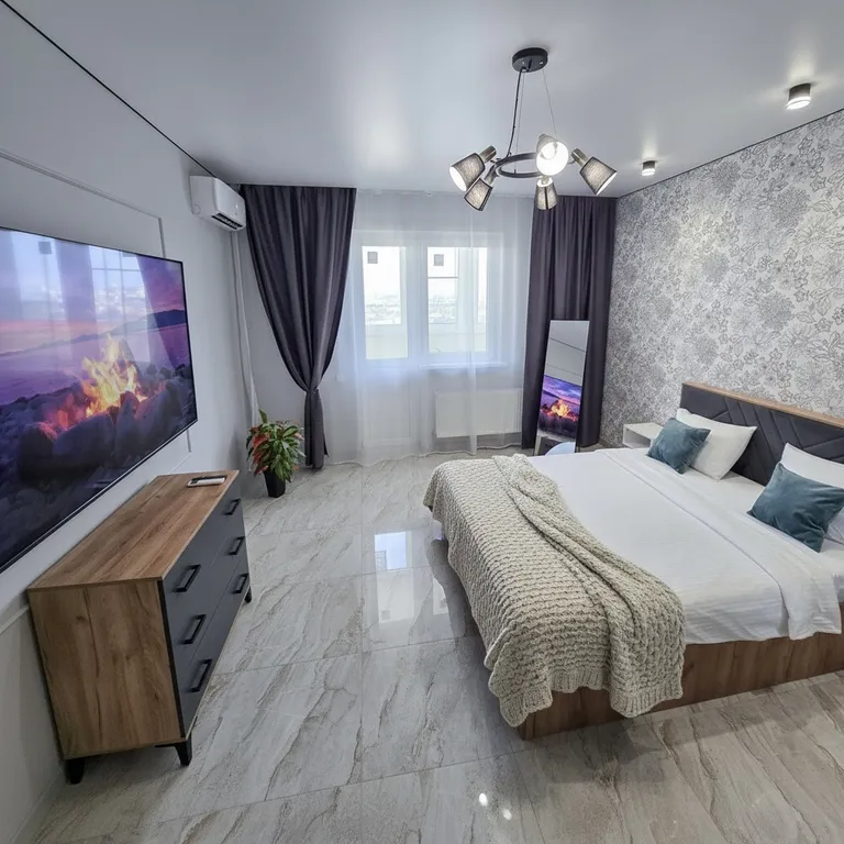 Апартамент с большим телевизором