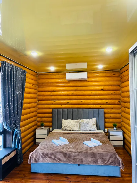 Семейные апартаменты Балдино в доме из сруба