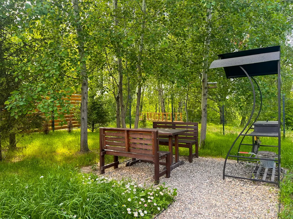 Дом на берегу реки с горячей купелью