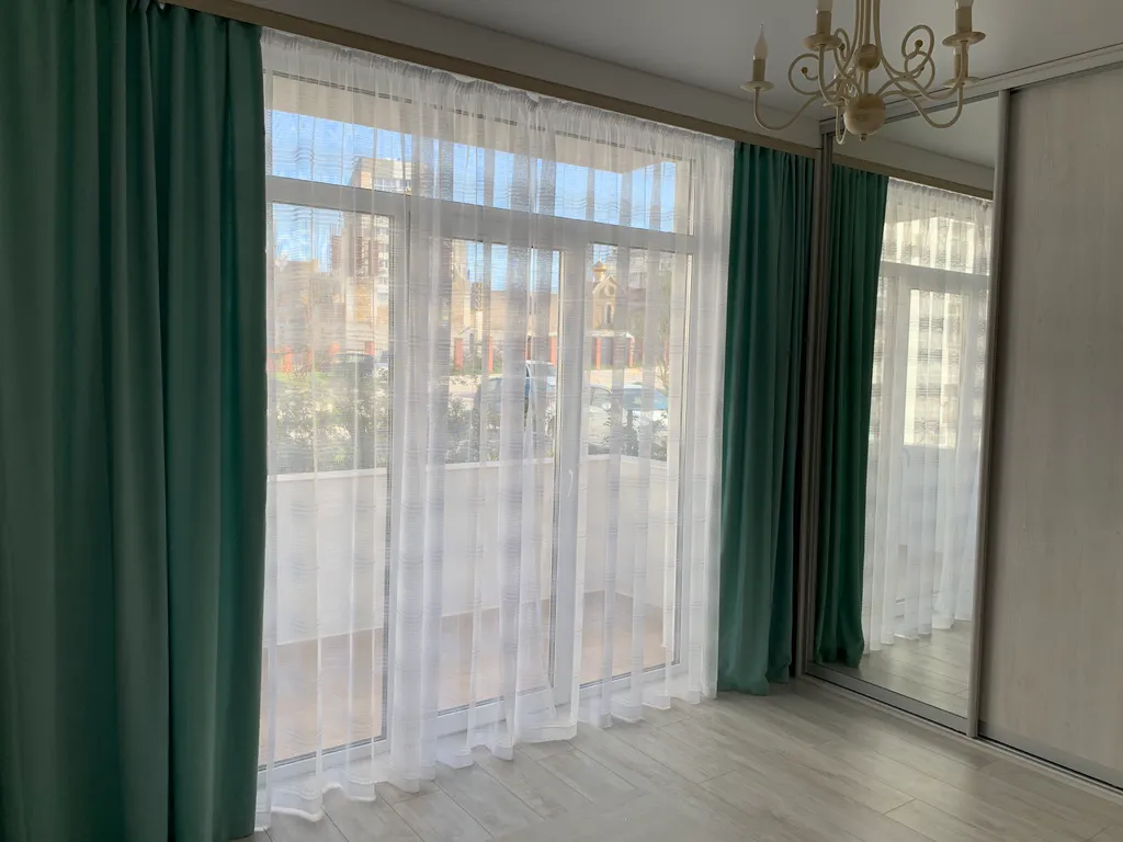 Новые апартаменты c террасой и видом на город и море