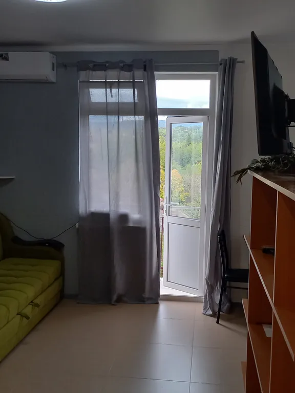 Апартамент с видом на море и горячими источниками