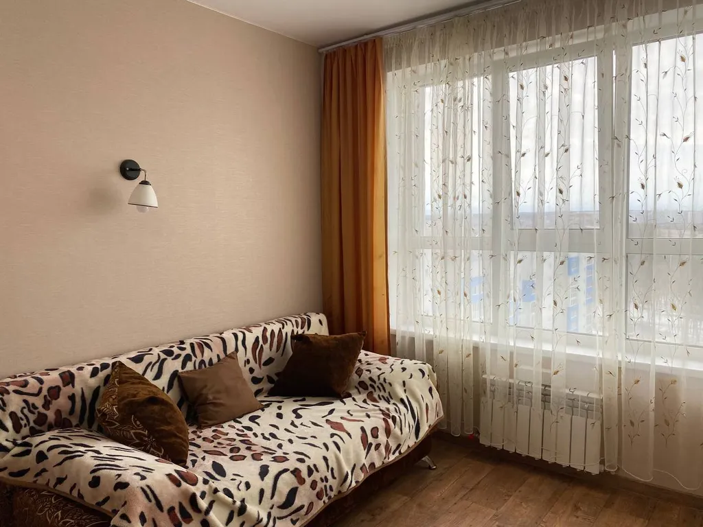 Уютная квартира с ортопедическим матрасом и панорамным балконом