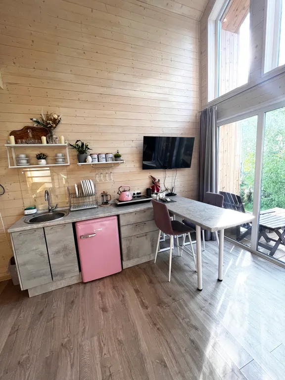 Дом с купелью на берегу реки