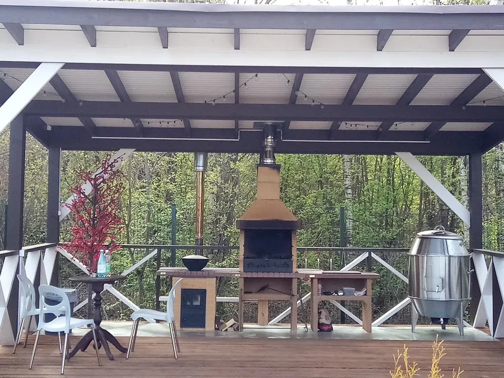 Уютный коттедж с баней и подогреваемой купелью.