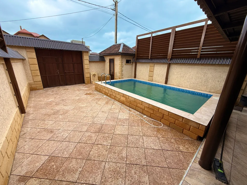 Коттедж дом с бассейном у берега Каспийского моря