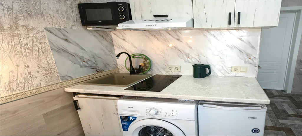 Уютная студия с балконом, отоплением, кухней, стиралкой, беседкой, парковкой