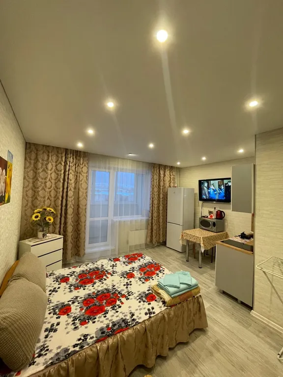 Уютная квартира студия в новом доме в центре города