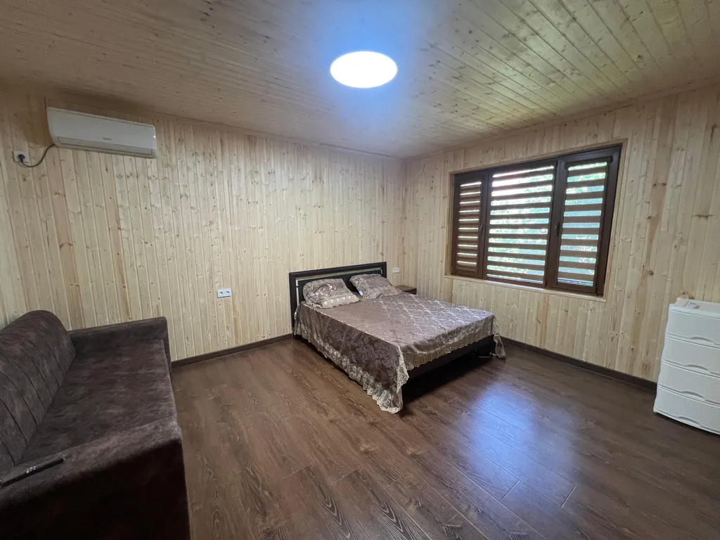 Дом у моря с террасой на речку