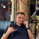 Николай