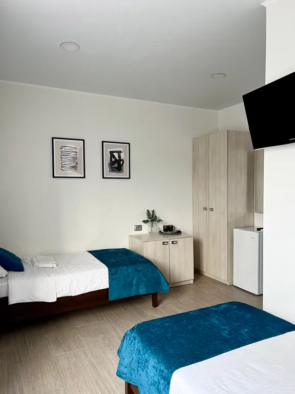 Квартира Квартира Уютный номер с 1 двуспальной или 2 раздельными кроватями — Сириус