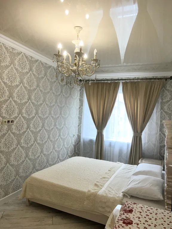 Апартамент с видом на море и на колесо обозрения