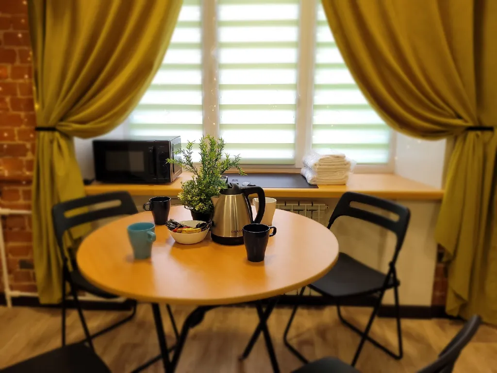 Лофт-1 Жёлтая. Клёвая двухуровневая студия в центре