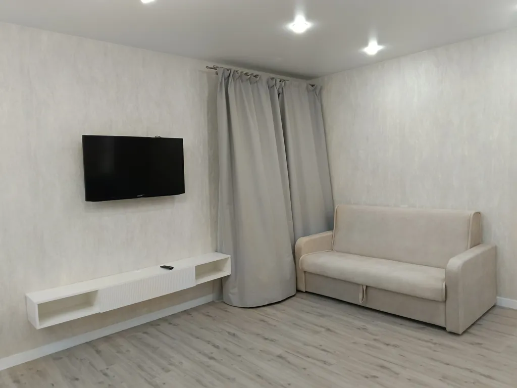 Уютная студия в новом доме с видом на Волгу