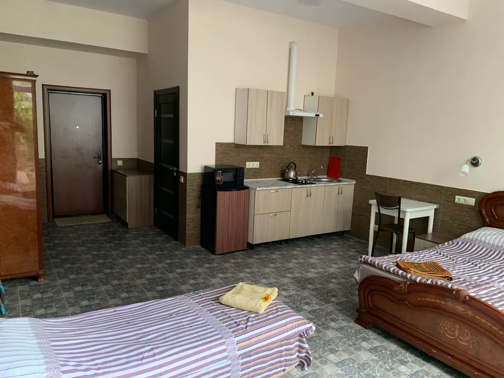 Пятиместный люкс с кухней и своей верандой