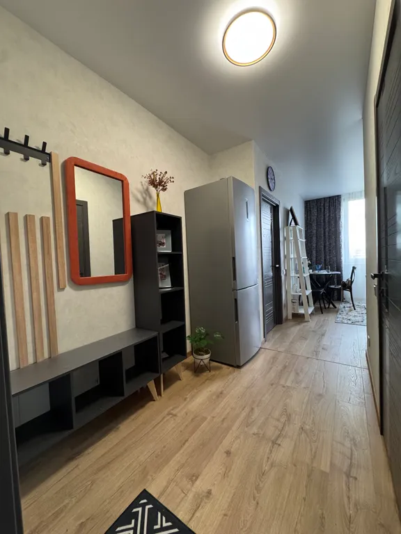 Квартира с большой кухней-гостиной и уютной изолированной спальней