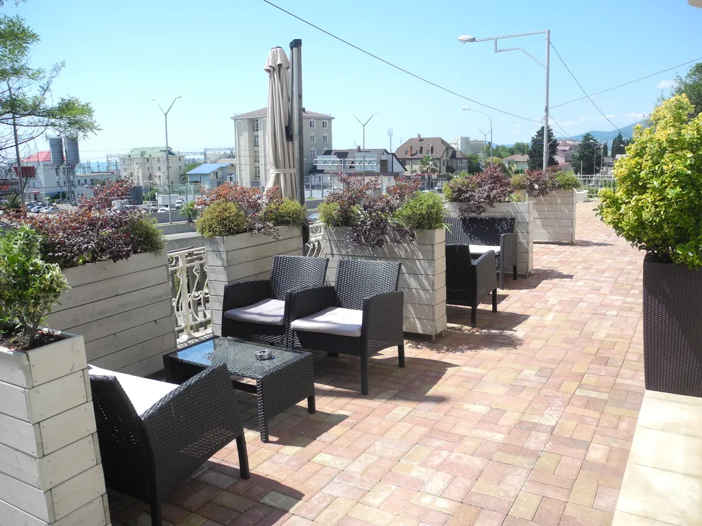 Квартира Квартира Уютная студия с видом на ж/д вокзал Адлер — Адлер