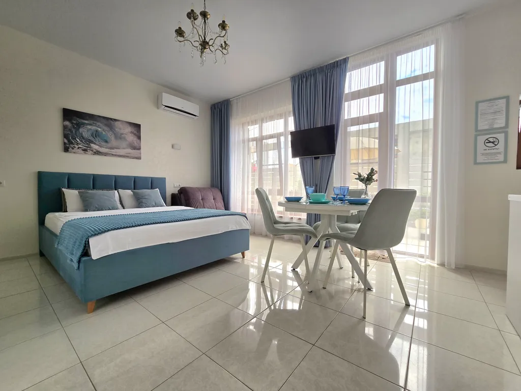 Квартира Квартира Уютная студия с выходом во дворик — Сириус