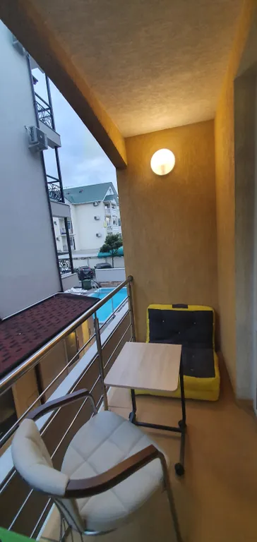 Квартира Квартира Уютная студия с тёплым бассейном и wi-fi — Сириус