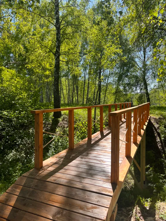 Дом на берегу реки с горячей купелью