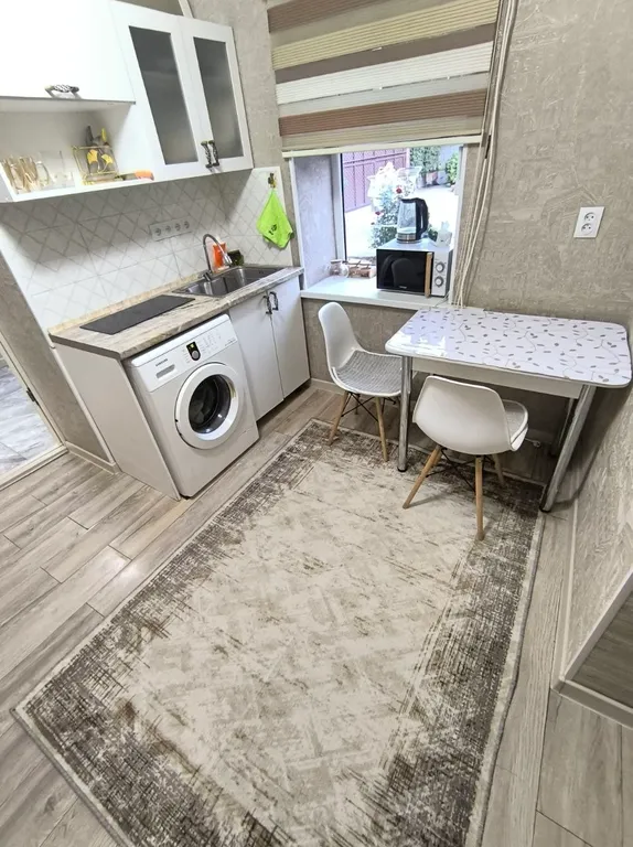 Уютный дом с садом рядом с центром города