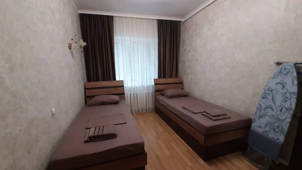 Уютный дом в центре города с местом для парковки автомобиля