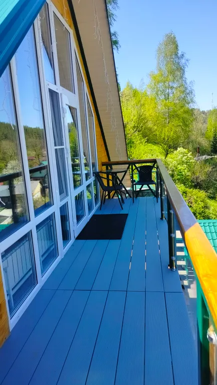 Апартаменты Романтика с панорамным окном в мансарде дома