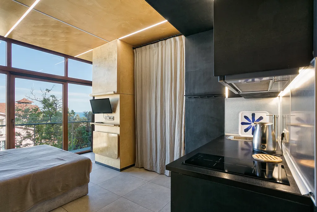 Современная квартира-студия под горой Кошка