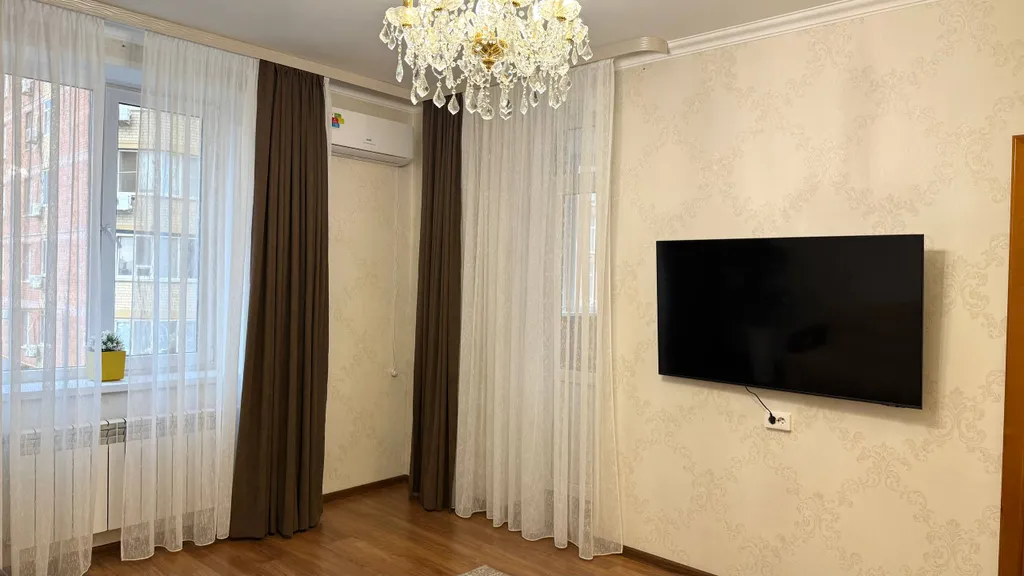 Семейная 2-комнатная квартира с детской кроваткой