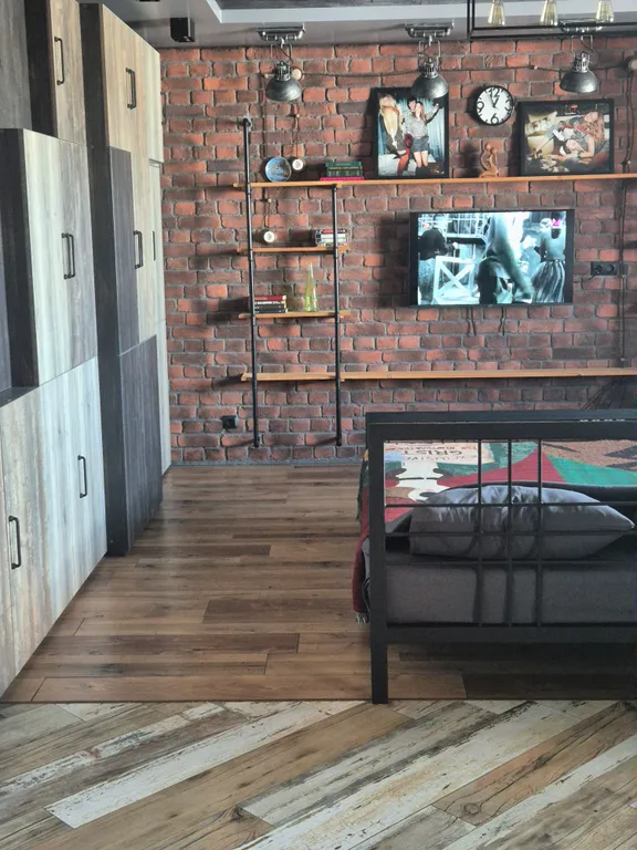 Студия лофт с видом на набережную столицы