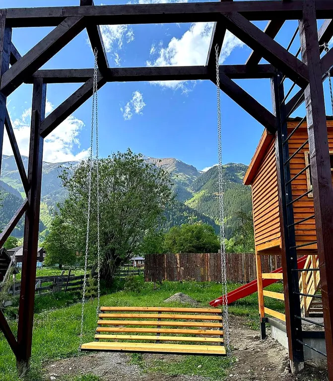 Коттедж Трёхкомнатные апартаменты с видом на горы — Архыз