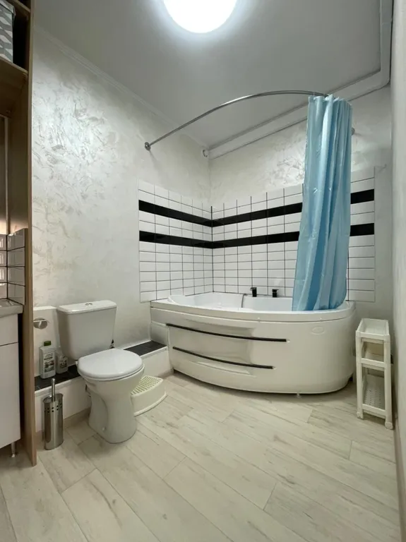 Квартира Квартира Уютная студия для семейной пары с джакузи — Сириус