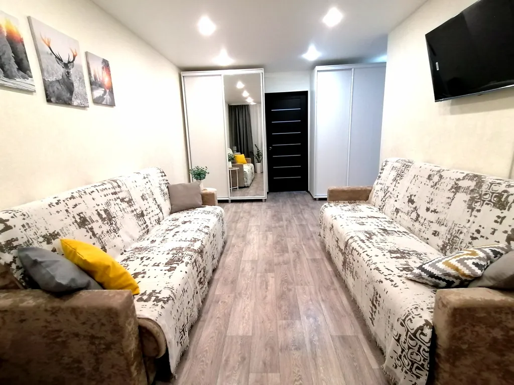 Уютная и тёплая квартира в центре города. Столовая расположена  в доме