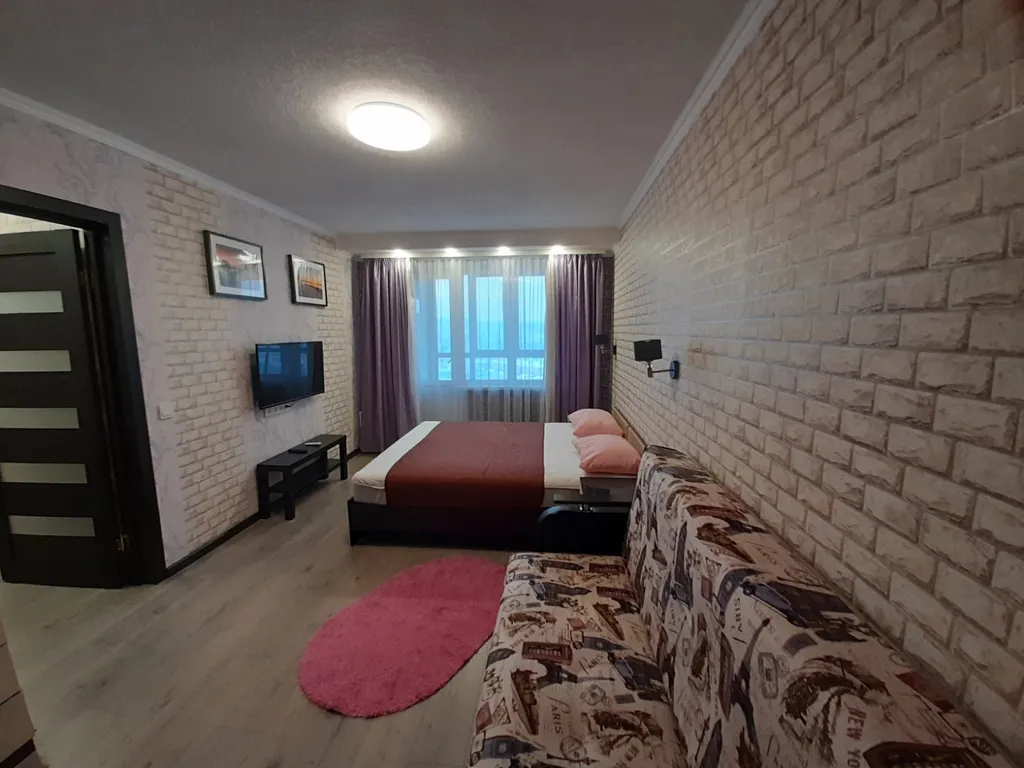 Квартира с балконом и видом на город и залив