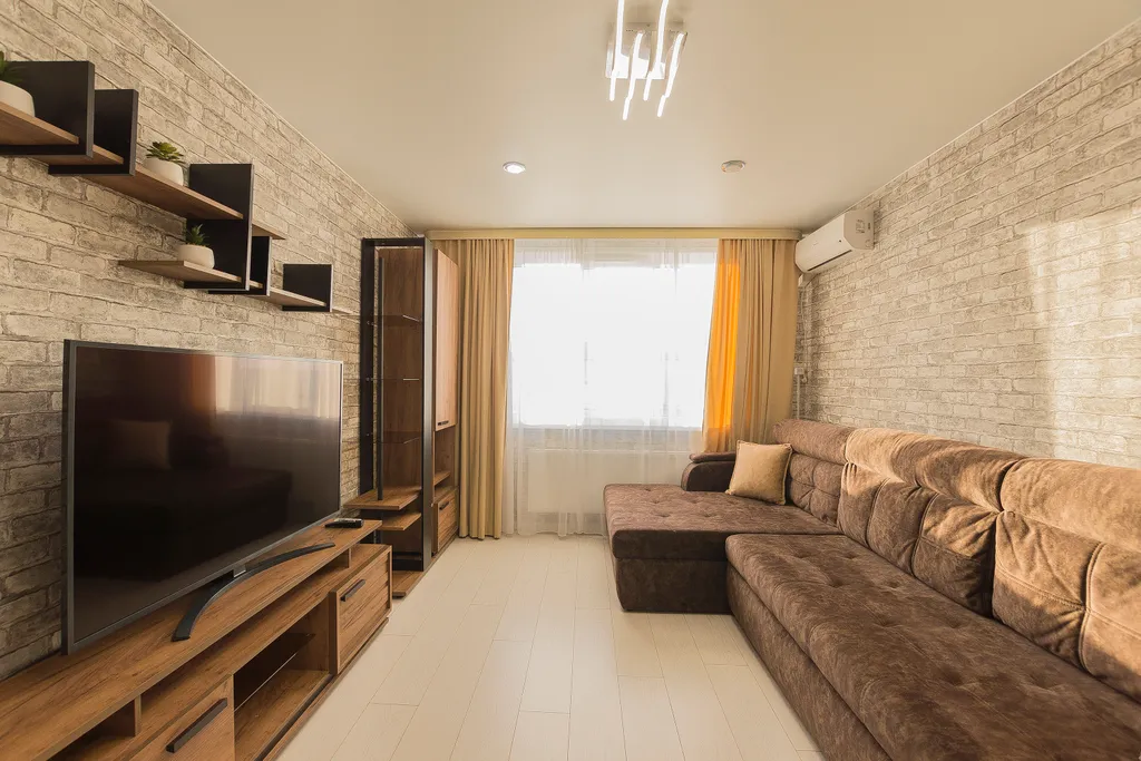 Уютная квартира в ЖК Паруса с подвесным креслом от Kravc Group